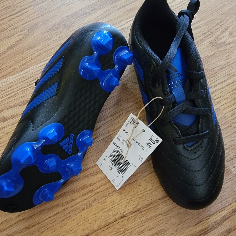 New Adidas kids soccer cleats, size 1.